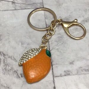 Orange rhinestone bag charm
